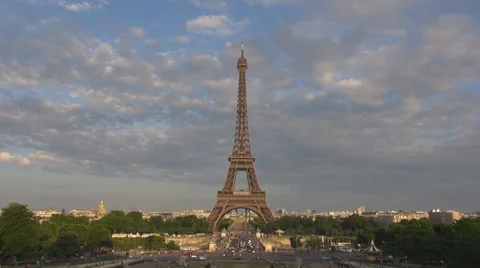 Eiffel Tower silhouette sunset Paris skyline traffic street landmark tourism day Stock Footage 44402737