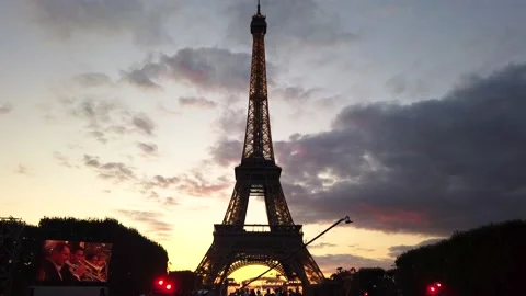 The Eiffel Tower silhouetted against a sunset on the Paris skyline, France Stock Footage 166815108