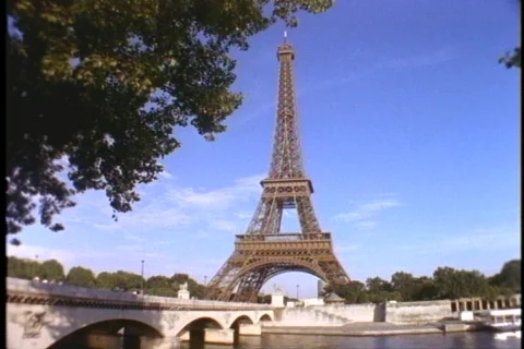 The Eiffel Tower stands high above the city of Paris. Stock Footage 551761