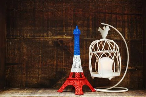 Eiffel tower statue with space copy on wooden background Stock Photos