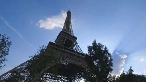 Eiffel Tower with Sun Rays Behind Stock Footage 127315897