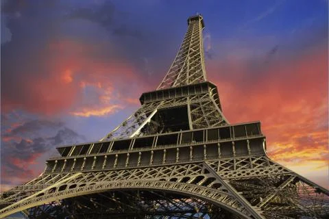 Eiffel Tower at Sunset against a Cloudy Sky 写真素材