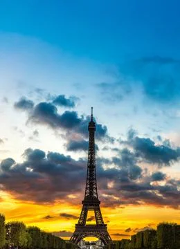 Eiffel Tower at sunset in Paris Stock Photos