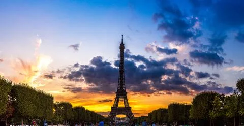 Eiffel Tower at sunset in Paris Stock Photos