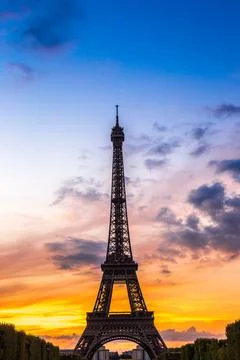 Eiffel Tower at sunset in Paris Stock Photos