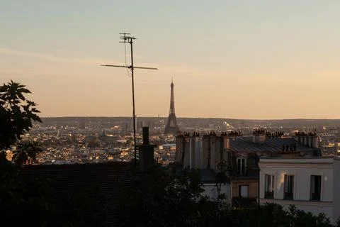 The Eiffel tower at sunset time from the top of Montmatre, Paris, 写真素材
