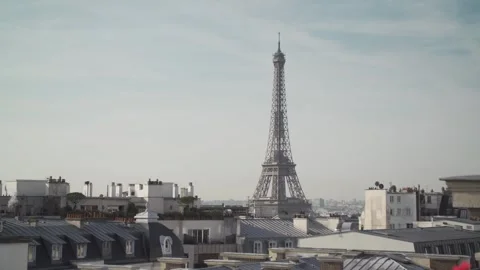 The Eiffel Tower surrounded by buildings Stock-Footage 331932129