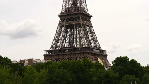 Eiffel Tower surrounded by trees from Pont des Arts, Paris, France Stock Footage 237924630