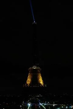 Eiffel Tower switches off lights to mark Earth Hour 2025, Paris, France - 22 Mar Stock Photos