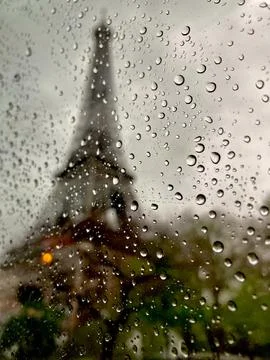 Eiffel Tower through Rainy Window Stock Photos