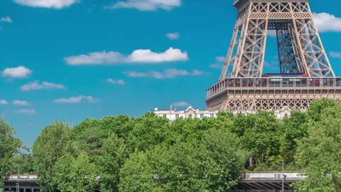 The Eiffel tower timelapse from bridge over the river Seine in Paris Stock Footage 236493217