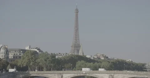 The Eiffel Tower (Tour Eiffel) and Bridge / Paris, France - 4K Stock Footage 69777178