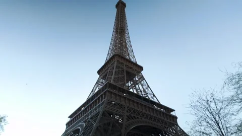 The Eiffel Tower Under a Clear Blue Sky in Paris, France Stock Footage 313640581