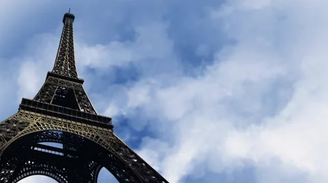 Eiffel Tower Upshot with Time Lapse Clouds Background Loop Stock Footage 57465852
