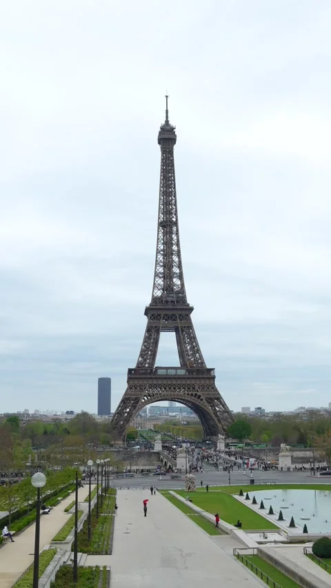 Eiffel Tower Vertical View with Crowd and Traffic in Paris Stock Footage 332971260