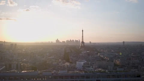 Eiffel Tower view over Paris during sunset with a warm sky and soft Stock Footage 283056831