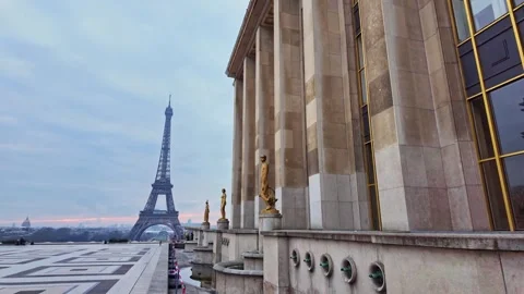 Eiffel Tower view from Palais de Chaillot terrace with gilded bronze statues Stock Footage 303636524