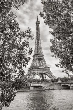 Eiffel Tower view on Seine river in Paris, France. Black and white colored 스톡 사진