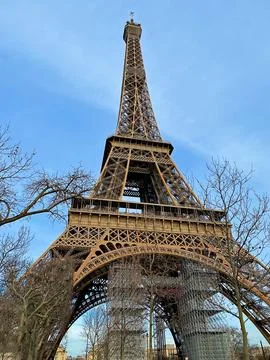 Eiffel Tower viewed from below on a clear winter day in Paris, France Stock Photos