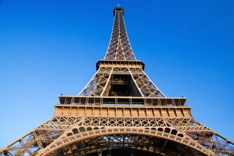 Eiffel tower at wide angle. blue sunny sky. paris, france Stock Photos