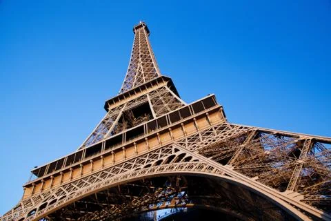 Eiffel tower at wide angle. blue sunny sky. paris, france Stock Photos