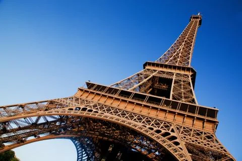 Eiffel tower at wide angle. blue sunny sky. paris, france Stock Photos