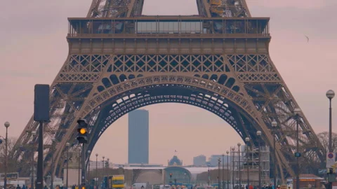 Eiffel Tower Wide Closeup Bottom ,Little Snow on Ecole Militaire in background Stock Footage 271602831