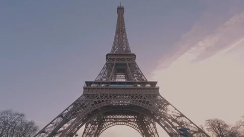 Eiffel Tower Wide Front Bottom High Angle Shot Time laps Blue sky Stock Footage 271669830