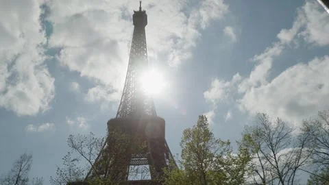 Eiffeltower in Paris viewed through spring foliage Stock Footage 248841014