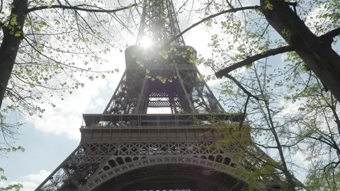 Eiffeltower in Paris viewed through spring foliage Stock Footage 248841165