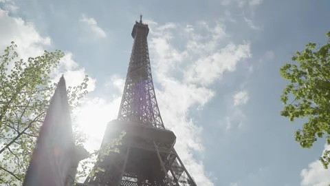 Eiffeltower in Paris viewed through spring foliage Stock Footage 248841384
