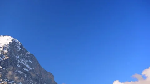 Eiger and the Clouds of Blue Sky Vídeos de archivo 330633034