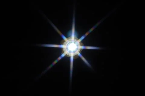 Eight-beam scattering of flashlight light. Stock Photos