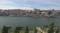 Eight boats anchored on Douro riverside in Porto 4k or 4k+ Resolution