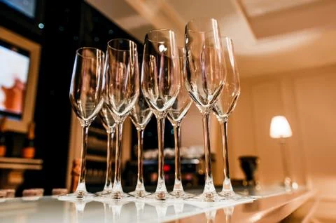 Eight empty glasses in a restaurant on a table 스톡 사진