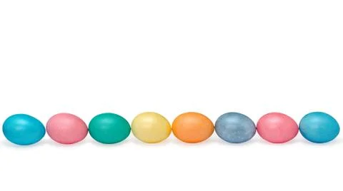 Eight happy easter eggs pastel colored isolated on white Stock Photos