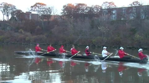 Eight man crew boat rows near shore Vidéo 998193