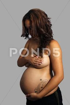 Eight months pregnant, intimate (1) Stock Photos