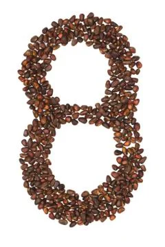 Eight number made of cedar  nuts Stock Photos