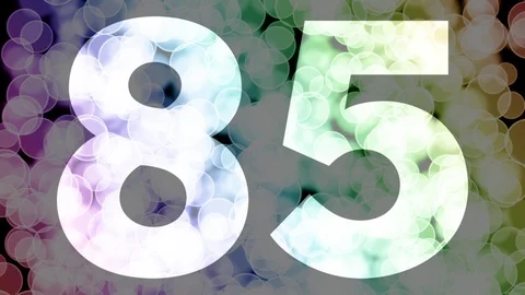 Eighty four to eighty five years birthday fade in/out animation with color bokeh Stockbeeldmateriaal 108535914