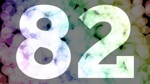 Eighty one to eighty two years birthday fade in/out animation with color bokeh Stockbeeldmateriaal 108535726