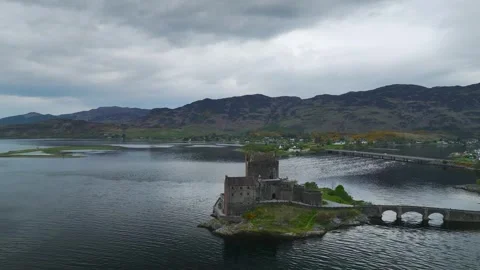 Eilean Donan Castle and Loch Duich from a drone, Isle of Skye, Scotland Stock Footage 308674487