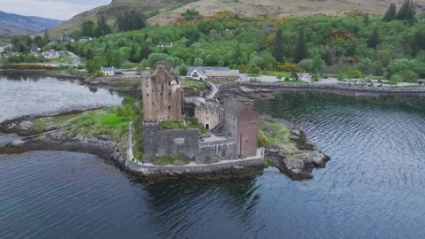 Eilean Donan Castle and Loch Duich from a drone, Isle of Skye, Scotland Stock Footage 308756904