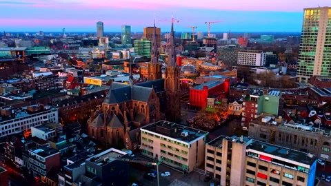 Eindhoven Skyline at Blue Hour 4K Drone Shot Sunset Sky Netherlands Stock Footage 334402004