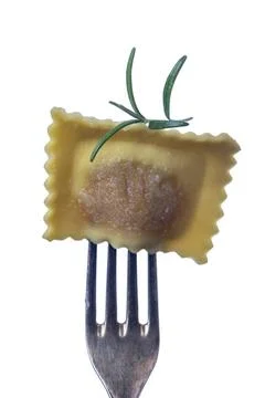 Einzelne rohe Ravioli auf einer Gabel *** individual raw ravioli on a fork... Stock Photos