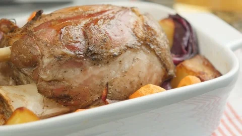 Eisbein on a rustic table Stock Footage 83919235