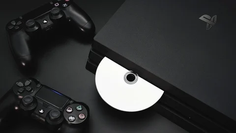 Eject disc from PS4 Pro Stock Footage 121352445