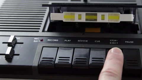 Eject white audio cassette from black cassette player. Closeup shot. Male hands 스톡 동영상 133522555