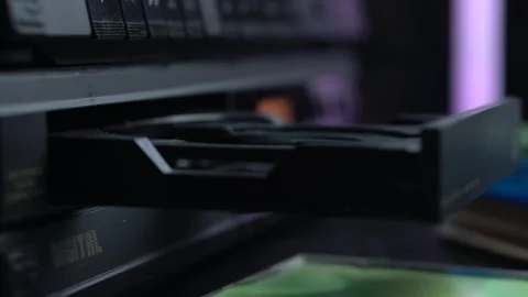 Ejecting and Taking Out Compact Disc From CD Audio Player, Close Up Stock Footage 323877654