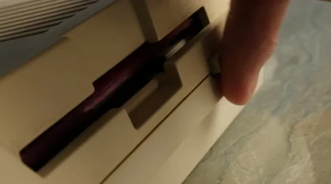 Ejecting diskette and taking from floppy drive close-up 4K 2160p 30fps UltraH 스톡 동영상 63844859